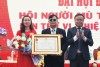 Phó Chủ tịch UBND tỉnh Lê Đức Tiến trao Huân chương Lao động hạng Ba cho Hội Người mù TP. Đông Hà